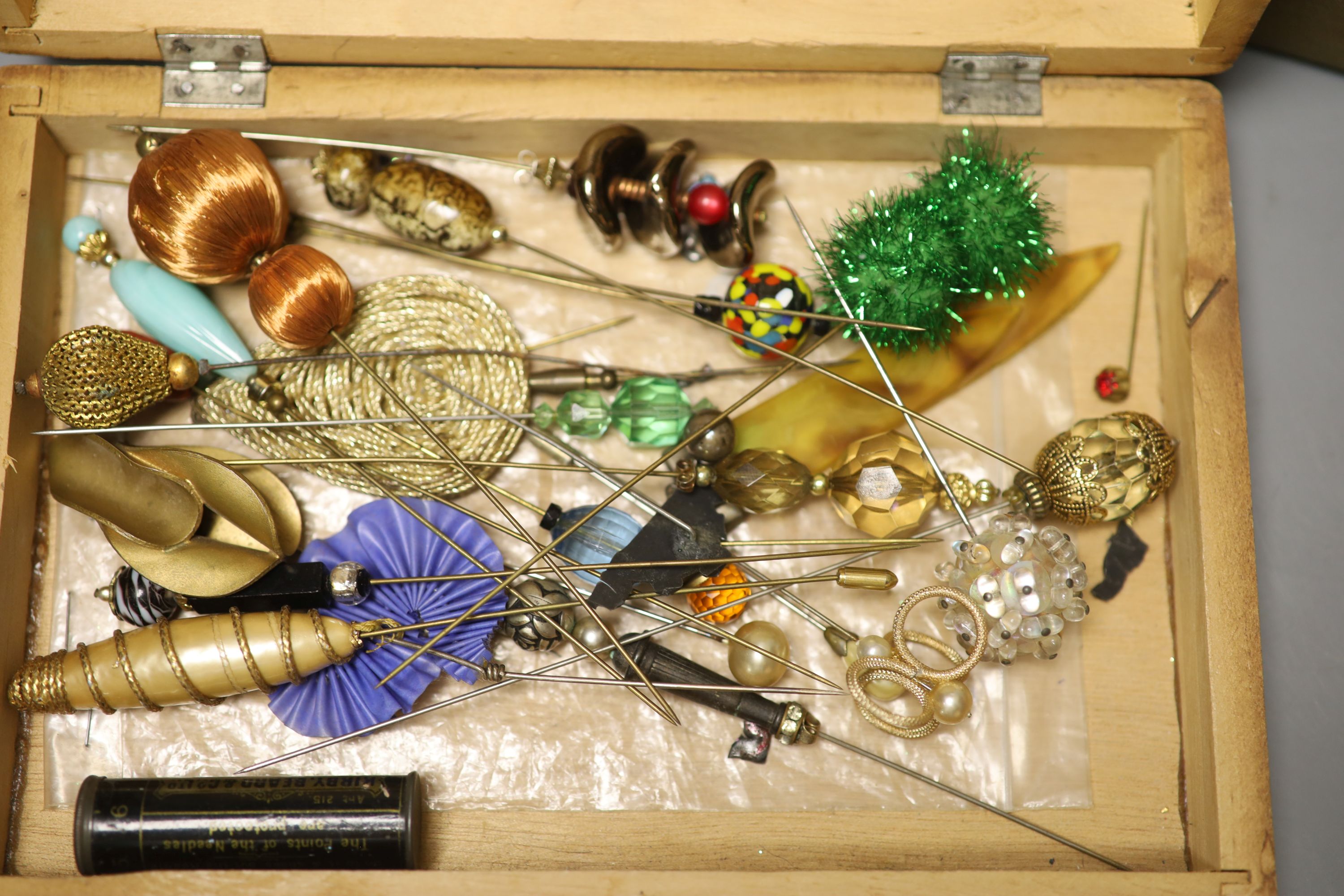 A quantity of mixed costume jewellery and hairpins.